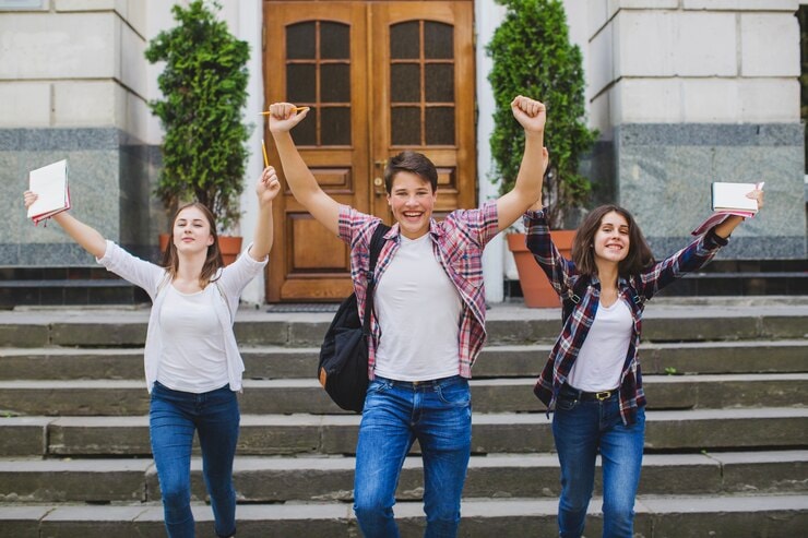 Friends raising their hands