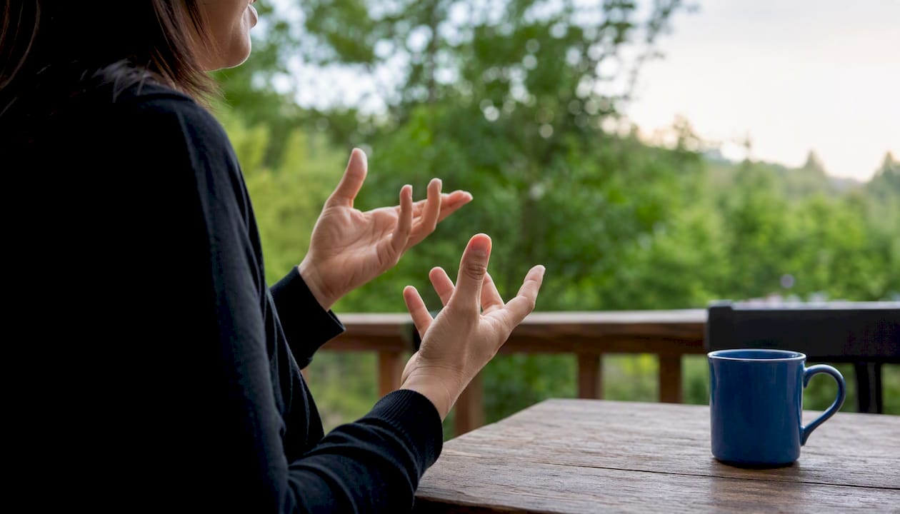 Hands of candidate gesturing while speaking